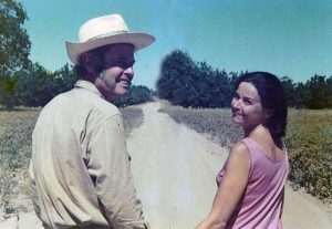 My farmer father and my concert pianist mother on the farm